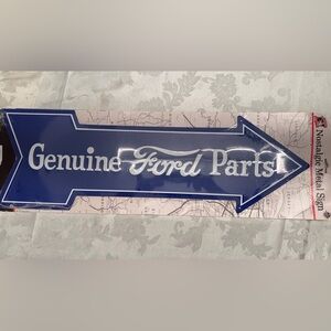 Ford Blue Arrow Sign with White Text “Genuine Ford Parts”